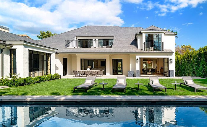 pe to your own private paradise in this Brentwood Park Traditional Estate.