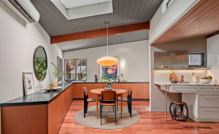 The Nelson lamp accentuate the dining area of this Bel Air Mid Century Modern home