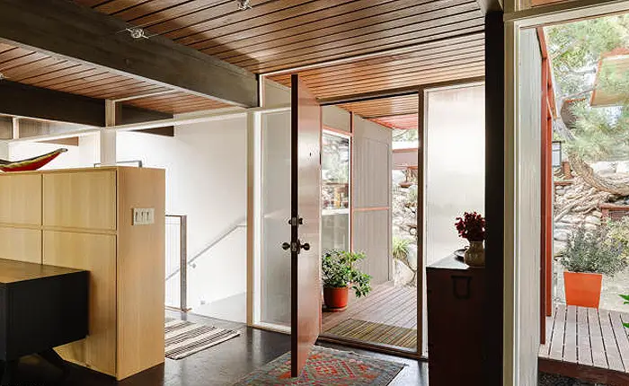 Expansive balconies, terracing, bridges and staircases extend the living experience outward at the Buff, Straub and Hensman Pasadena post & beam home