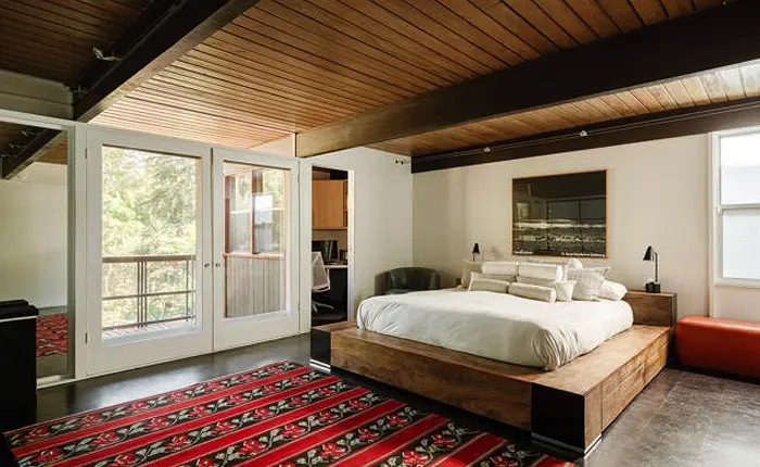 The primary suite of the John Norton House offers an expansive retreat with its own adjacent office