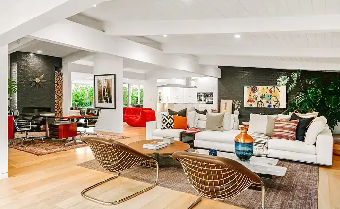 Living room designed by architect Richard Dorman highlighting post and beam construction