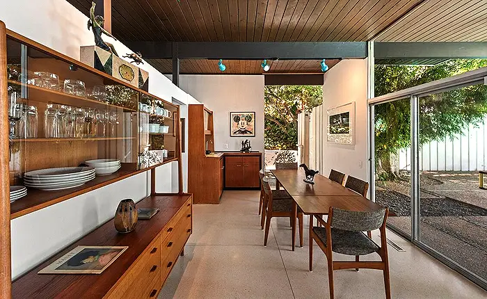 Dining room in a mid-century modern home designed by A. Quincy Jones