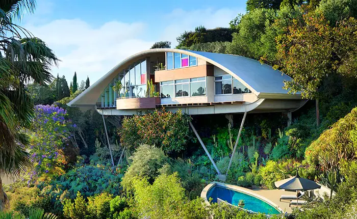 Panoramic view of John Lautner's Garcia House integrated with Los Angeles hillside landscape