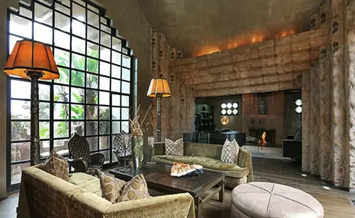 Living room of the Sowden House in Los Feliz by Lloyd Wright showing his textile block designs
