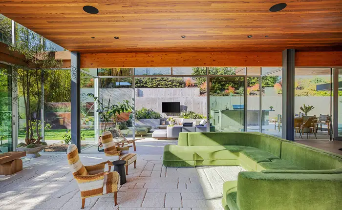 Ray Kappe modern home with walls of glass and framed outdoor views