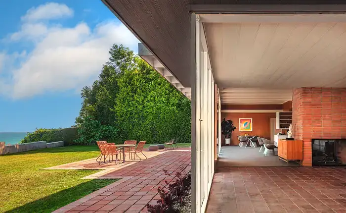 Interior of Rodney Walker Case Study House showing open plan living and floor-to-ceiling glass